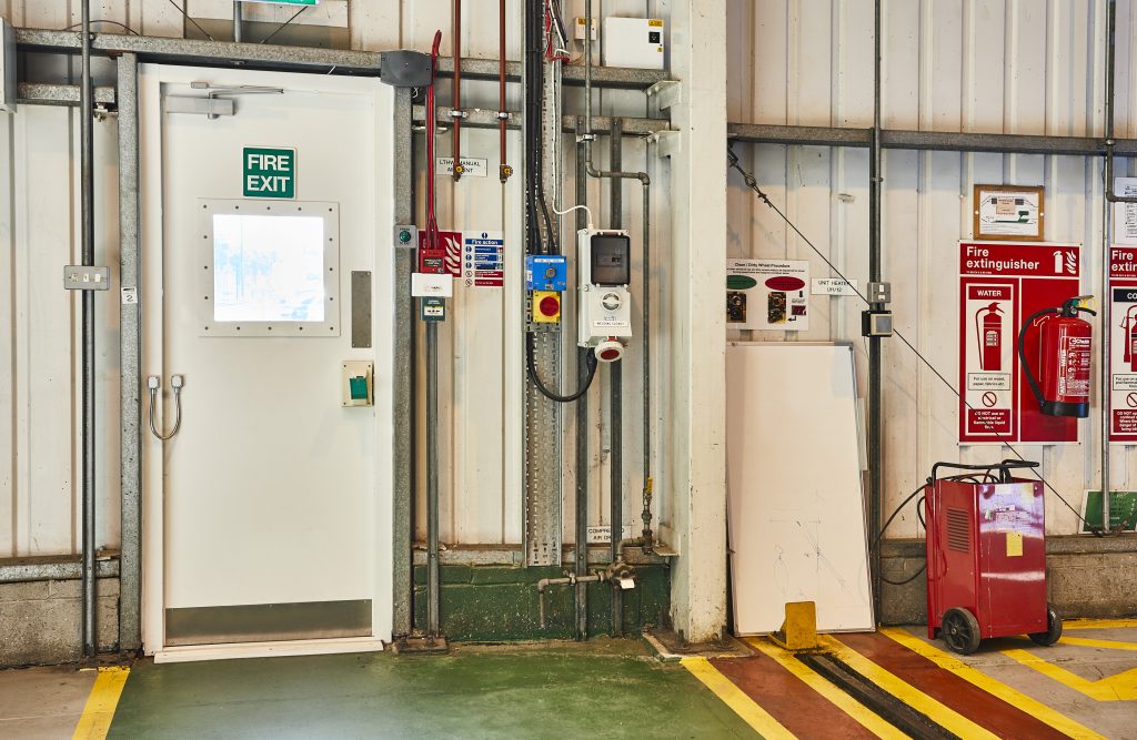 Croydon Tramline Depot fire exit door with vision panel. 