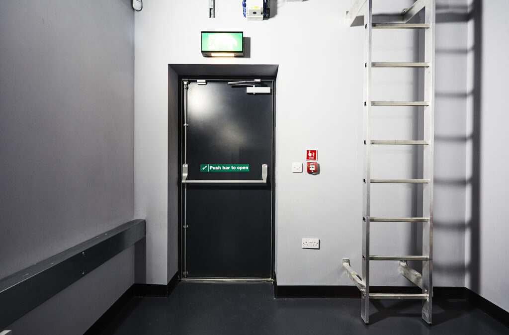 Cineworld - Ely Leisure Village external steel fire door with push bar 