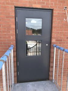 Black steel security doors with two glass panes