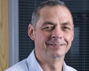Man looking ahead smiling