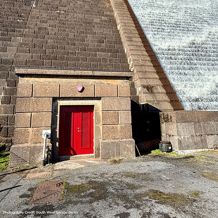 Red Metador Louvred Steel Doorset at Avon Dam premise. Used as a maintenance personnel door.