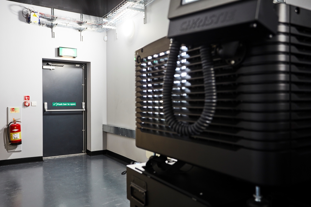 Single acoustic rated and fire exit steel door located inside a cinema